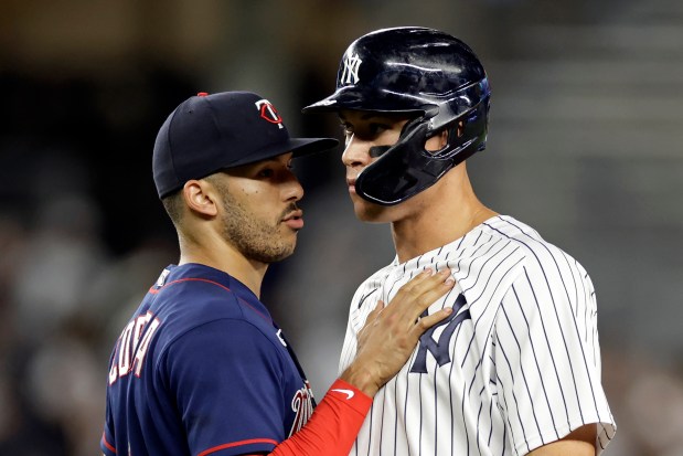 Minnesota Twins' Carlos Correa, left, talks to New York Yankees' Aaron Judge after the final out of the ninth inning of a baseball game Thursday, Sept. 8, 2022, in New York. (AP Photo/Adam Hunger) Minnesota Twins' Carlos Correa, left, talks to New York Yankees' Aaron Judge after the final out of the ninth inning of a baseball game Thursday, Sept. 8, 2022, in New York. (AP Photo/Adam Hunger)