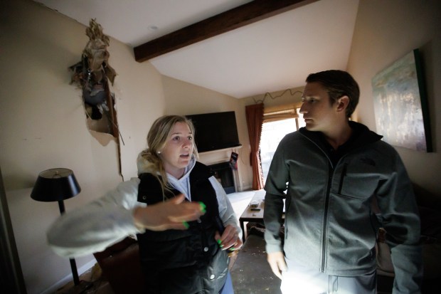 Lauren and Eric Kirchick recount the early Tuesday morning when a tall eucalyptus tree fell onto their condo unit causing significant damage. Lauren was in their bedroom when the tree fell, and she still tears up when recounting her experience. Eric, who was not in the bedroom when the tree fell, was able to rescue her. (Dai Sugano/Bay Area News Group)